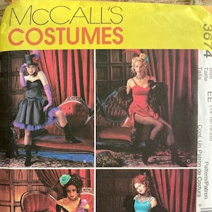 May include: A vintage sewing pattern for four different costumes. The pattern is for sizes 14-16-18-20. The costumes are a saloon girl, a showgirl, a pirate, and a Victorian lady. The pattern is from McCall's Costumes.