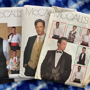 May include: Three McCall's sewing patterns for men's formal wear. The patterns feature different styles of vests, shirts, and bow ties. The patterns are numbered 8000.