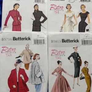 May include: Four Butterick sewing pattern envelopes labeled B6379, B5880, B5716, and B5813. Each white paper envelope features illustrations of clothing designs, including jackets, skirts, and dresses, with barcodes and text printed on the front.