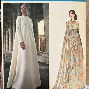 May include: Vintage Vogue Couturier Design sewing pattern number 2537 by Fabiani. The pattern features two long dresses, one white and one with a floral print.