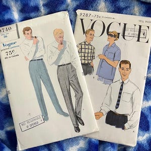 May include: Two vintage Vogue sewing patterns for men's shirts and pants. The patterns are printed on white paper with black and blue illustrations. The pattern numbers are 9740 and 9287.