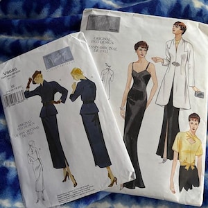 May include: Two vintage Vogue sewing patterns from 1935, featuring illustrations of women's fashion designs. The patterns showcase a variety of styles, including dresses, suits, and coats. The patterns are on a blue and white patterned background.
