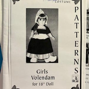 May include: A black and white photo of a doll wearing a Dutch costume. The doll is wearing a white bonnet, a black and white dress, and wooden shoes. The image is a pattern for a Dutch costume for an 18-inch doll.