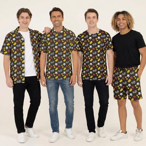 May include: A collection of apparel featuring a dark grey pattern of yellow shoes, white gloves, and red shorts. The set includes a short-sleeved button-down shirt, a polo shirt, a crew-neck t-shirt, and shorts, paired with black or blue denim trousers.