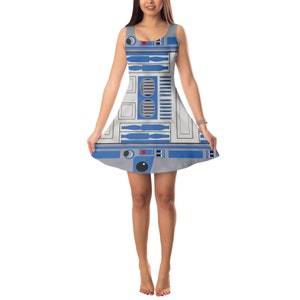 a woman in a dress with a robot on it