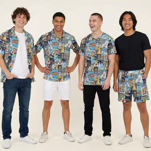 Peut inclure: Une collection de vêtements arborant un imprimé collage de bandes dessinées colorées. Les articles comprennent des chemises à manches courtes boutonnées et des shorts, associés à des t-shirts blancs, jeans bleus et pantalons noirs.