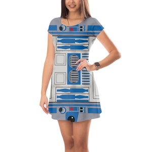 a woman in a dress with a robot on it