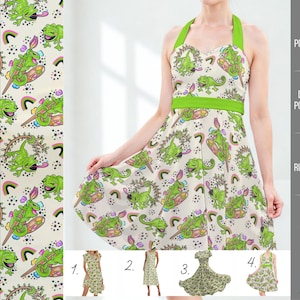 May include: A cream-coloured halter midi dress featuring a green frog and rainbow pattern. The dress has a green halter neckline and waistband. The image also shows a fabric swatch with the same pattern and three other dress styles.