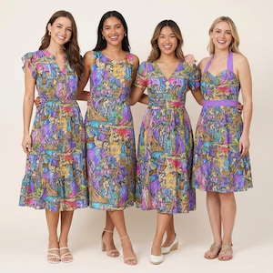 May include: Four women in vibrant dresses with a stained-glass pattern. The dresses, in shades of purple, blue, and yellow, have different necklines and sleeve designs. The dresses are knee-length and have a fitted bodice, suitable for a special occasion.