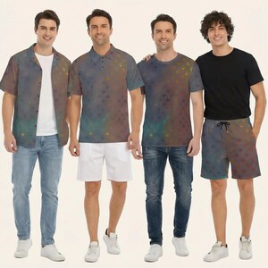 May include: A collection of apparel featuring a dark, nebulous print with scattered colourful specks. The set includes a short-sleeved button-down shirt, a polo shirt, a crew-neck t-shirt, and drawstring shorts, paired with blue jeans and white shorts.
