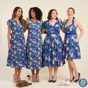 May include: Four blue dresses featuring a repeating pattern of yellow figures, castles, and pink flowers. The dresses vary in style, including flutter sleeves, sleeveless cuts, short sleeves, and a halter neck design with a fitted waistline.