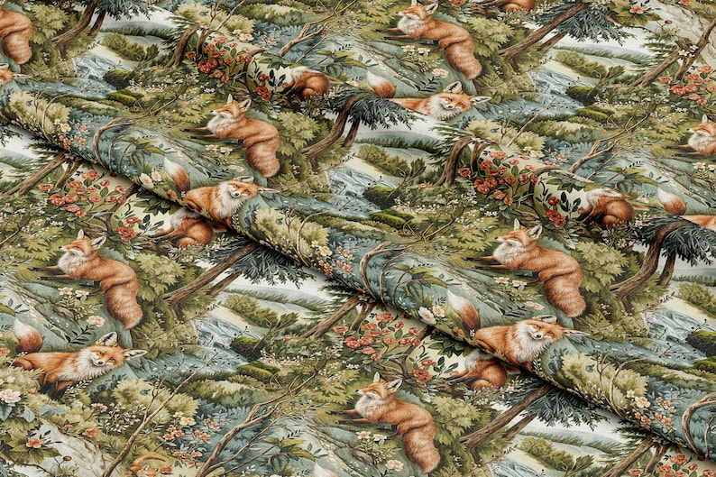 May include: A repeating pattern of red foxes resting in a lush green forest setting. The fabric features a detailed illustration of the foxes, trees, and foliage.