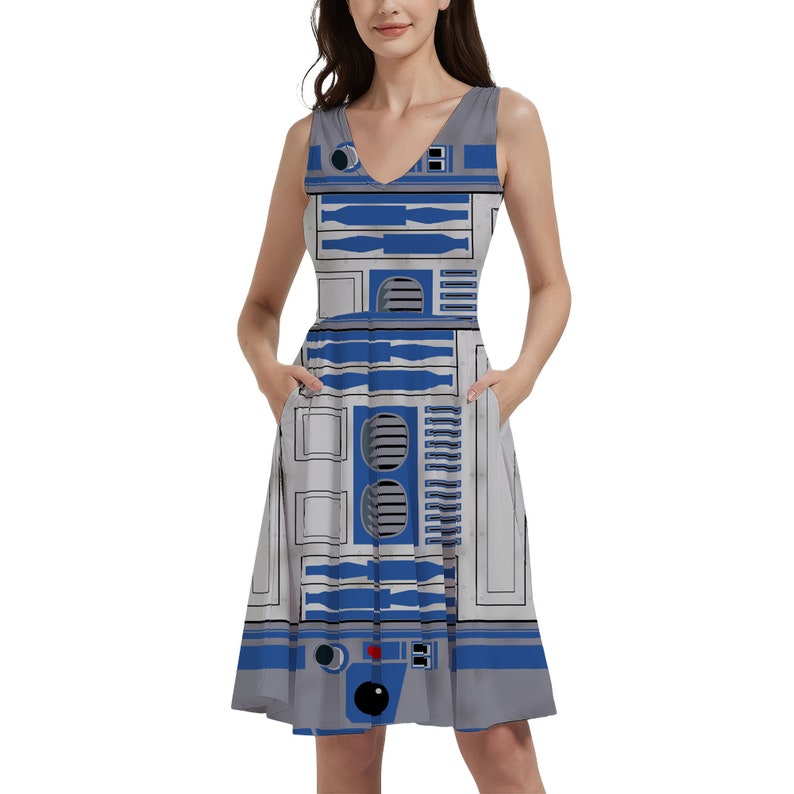 a woman in a dress with a robot on it