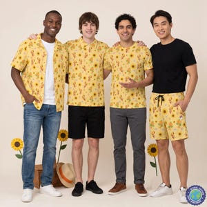 May include: Four individuals wearing yellow clothing featuring a repeating pattern of sunflowers and small orange characters. The outfits include a short-sleeved button-down shirt, a polo shirt, a t-shirt, and drawstring shorts, paired with jeans and trousers.