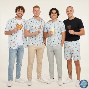 May include: A light blue short-sleeve button-down shirt with a repeating pattern of snacks, a light blue polo shirt with a matching snack pattern, a light blue t-shirt with a matching snack pattern, and light blue shorts with a matching snack pattern.