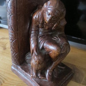Antique plaster bookend The Fool with Owl