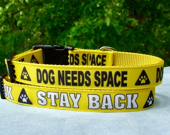 CAUTION warning yellow leash covers.
