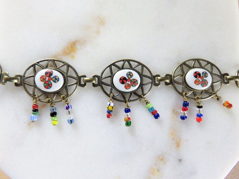 B455 Unique Filigree Glass Fringe Link Bracelet Vintage Oval Mod White Colorful Design Gold Seed Fold Over Boho Gypsy Cutout Dangle Fun Mix