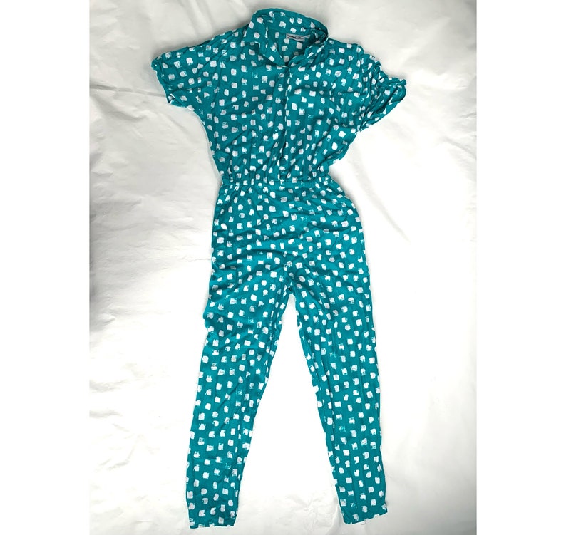 Vintage 80s jumpsuit by Krash short sleeve Medium 6 shoulder pads button up blue green white dotted squares grid one piece 1980s rayon