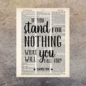 May include: Black and white typography quote on a vintage dictionary page. The quote reads "If you stand for nothing what you will fall for".