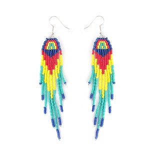 May include: A pair of long, colorful beaded earrings with a geometric pattern. The earrings are made with blue, red, yellow, and green beads.