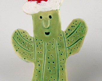 Saguaro Cactus Christmas Ornament by Southwest Ceramic Artist, Karlene Voepel.  Sold individually.