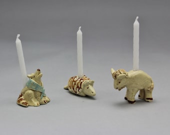 Birthday Candle Holders: Snowman, Coyote, Javelina, Armadillo, Buffalo, Frog, Bear, Elephant, Giraffe, Dinosaur, Humpty. Sold Individually