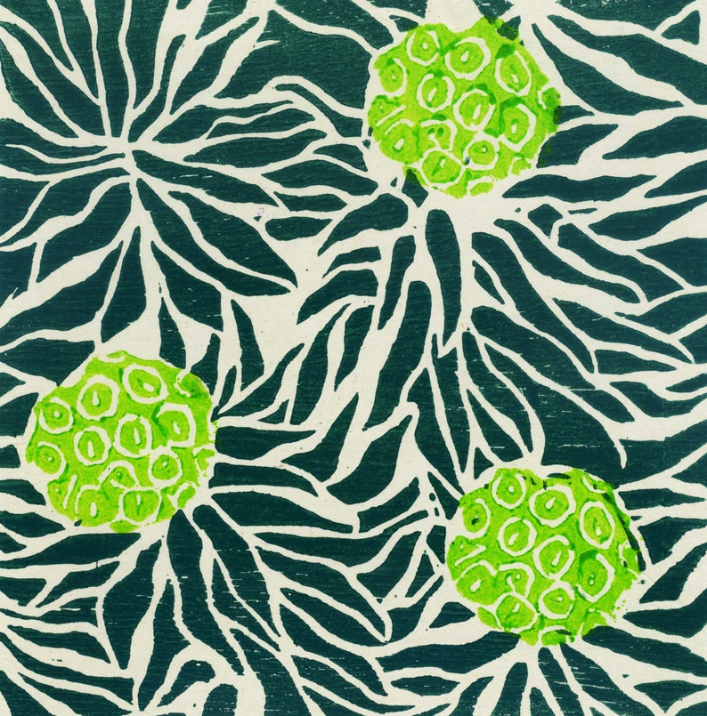 May include: A green and white abstract pattern with three green circles with smaller circles inside. The background is a dark green color.