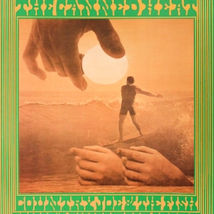 May include: A vintage poster with a green and orange color scheme. The poster features a surfer riding a wave with a large hand reaching down from the sky. The hand is holding a glowing orb. The poster is surrounded by a border of green and gold symbols.