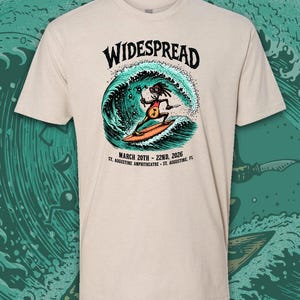 Könnte beinhalten: Ein Set aus drei Keramikbechern mit gesprenkelter, matter Oberfläche. Jeder Becher hat eine andere Farbe: hellblau, cremefarben und grau. Die Becher haben ein schlichtes, modernes Design mit runder Form und bequemem Griff.