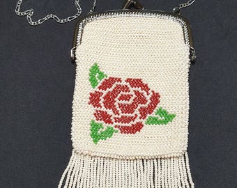 The "Pasadena", an off-white bead knit purse with rose motif, silver frame and chain, lined