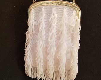 The "Charleston" bead knit purse, in white with gold purse frame and chain, lined