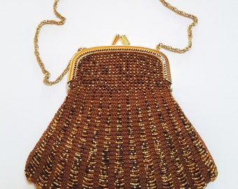 Hampton style bead knit purse, wrist length, framed and lined, in brown and gold tones