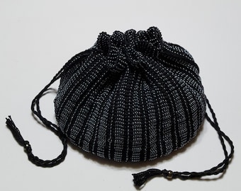 The Dover, a bead knit, handmade pouch purse fully lined in black