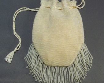 The Springfield - A Bead Knit Purse in ivory with drawstring and fringe