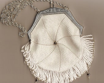 The Sierra, a bead crocheted vintage replica purse with frame and fringe