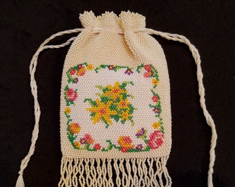 The "Somerset", a cute drawstring purse with a flower motif, bead knit, handmade in the Victorian tradition