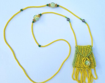 Brigitte Style bead knit necklace, amulet bag in green and yellow with flowered focal beads
