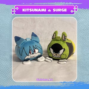 May include: Two plush toys: a blue fox-like character with blue hair and a green character with a black face and sharp teeth. The text "KITSUNAMI & SURGE" is at the top. The artist's name, "Sinisters.Art", is at the bottom.