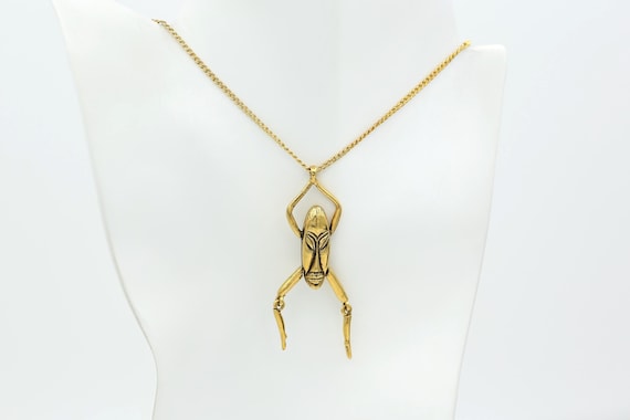 Vintage 70s Articulated Figure Pendant Necklace • Modernist African Mask • Gold Tone • R.I. Bead & Comp