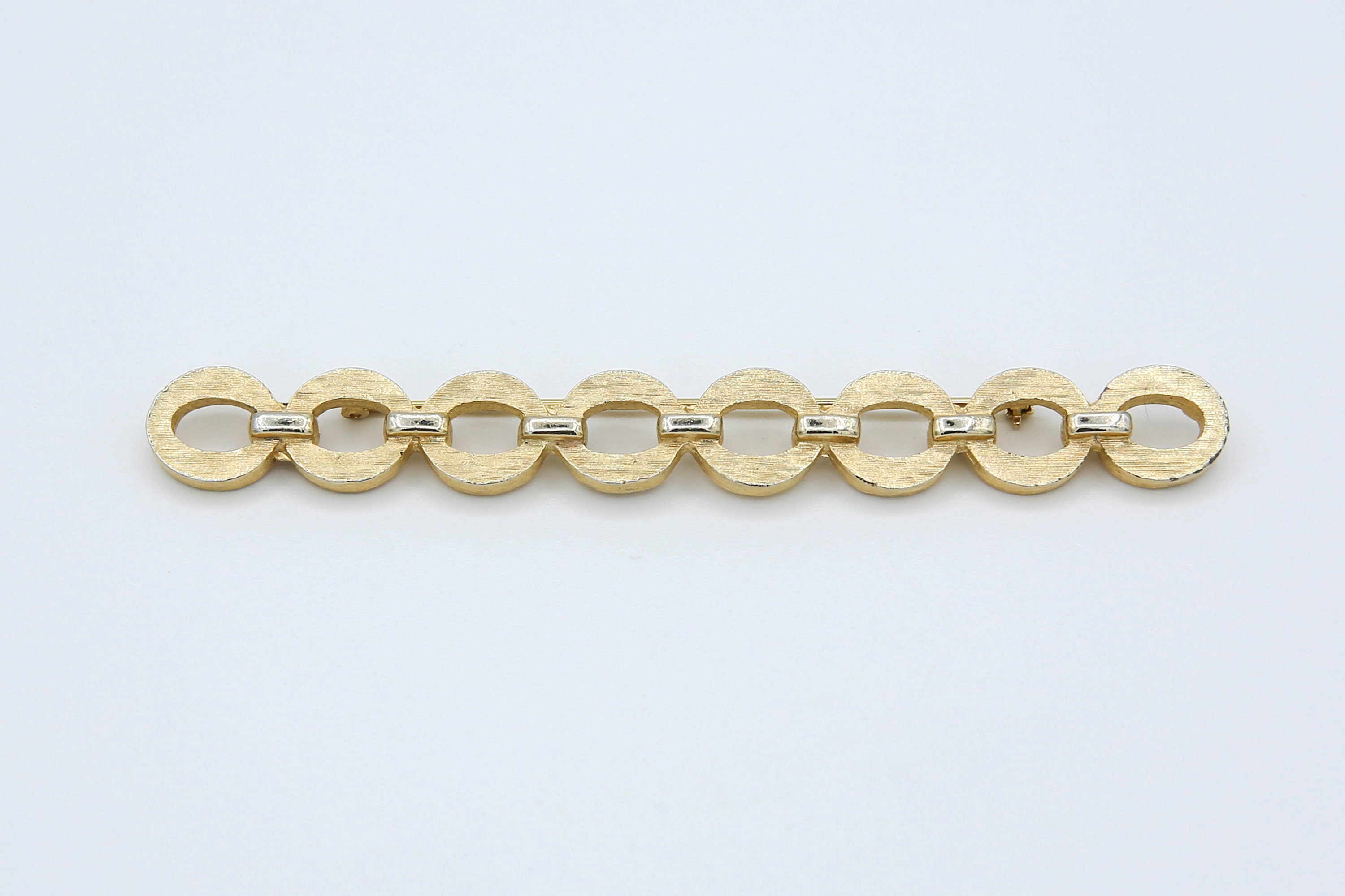 Gold Chanel Pin 