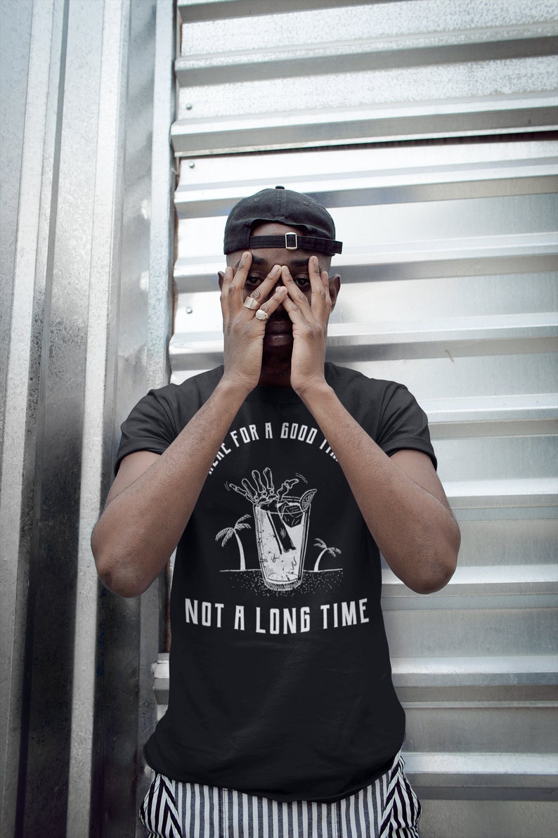 May include: Black t-shirt with a white graphic of a skeleton hand reaching into a glass of ice with a lemon wedge. The text "Time for a good time, not a long time" is printed below the graphic.