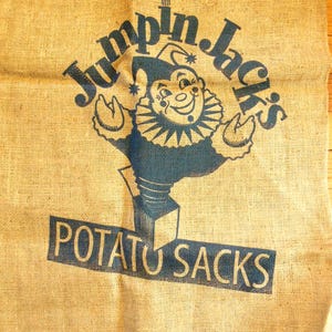 Vintage Jumpin Jack&#39;s Potato Sacks 22&quot; W X 38&quot; L Tan Burlap w/ Blue Graphic 100Lb Bag Unused Condition for Storage, Crafts, Fabric
