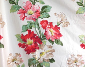 May include: White fabric with a repeating floral pattern. The flowers are in shades of red, pink, and cream, with yellow centers and green leaves. The design is a classic, vintage style.