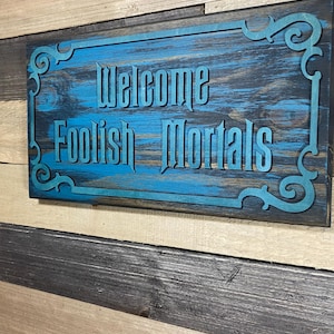 Welcome Foolish Mortals wood sign