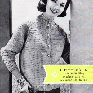 May include: A black and white photo of a woman wearing a gray knitted cardigan with a button-up front. The cardigan has a textured pattern and is labeled "GREENOCK double knitting or BRI-NYLON quick-knit six sizes 34 to 44".