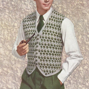May include: A man wearing a white shirt and a green and white patterned vest. He is holding a pipe in his right hand. The vest is labeled "Waistcoat in Scotch 2 Ply Fair Isle" and the image is numbered "289".