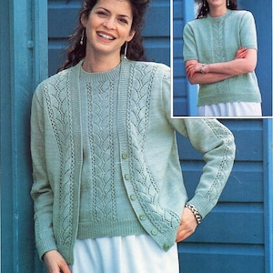 May include: A light green knitted cardigan with a matching top. The cardigan has a button-up front and a cable knit design. The top has a crew neck and a similar cable knit design.