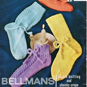 May include: A vintage knitting pattern cover featuring several knitted socks in various colors: orange, light blue, yellow, and purple. The cover includes the text "BELLMANS" and "double knitting and chunky crepe."