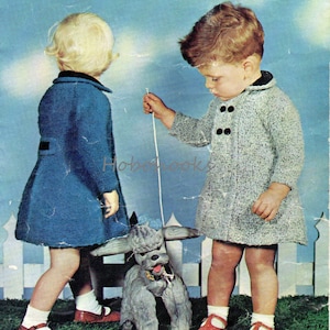 May include: Two children, one wearing a blue knitted coat and the other wearing a grey knitted coat, are standing in front of a white picket fence. They are holding a grey toy poodle on a string. The image includes the text "C-287 6D", "TWO SIZES TO FIT 20-23 INCH CHEST", "PATONS", "P&B WOOLS", and "Rimple DOUBLE KNITTING".